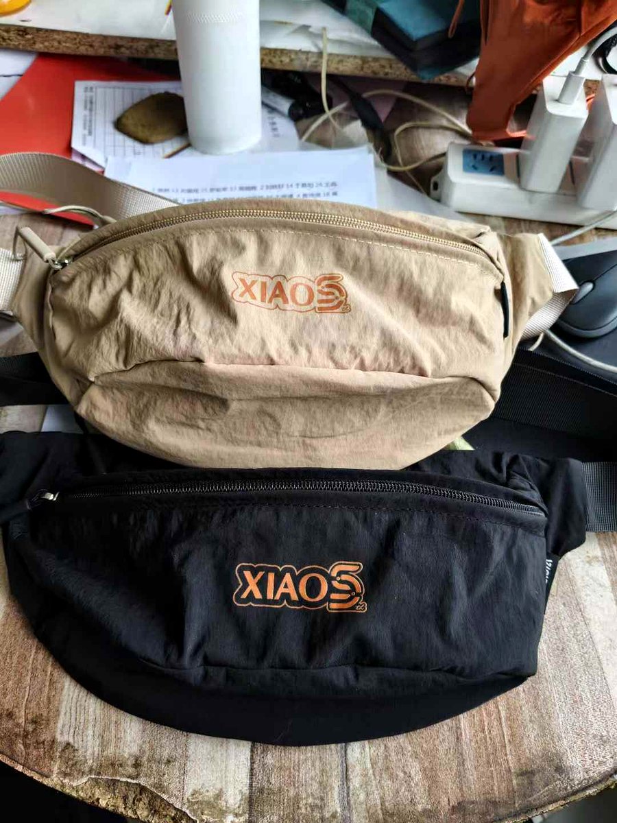 Custom two-color waist bag with front logo print for retail brand project